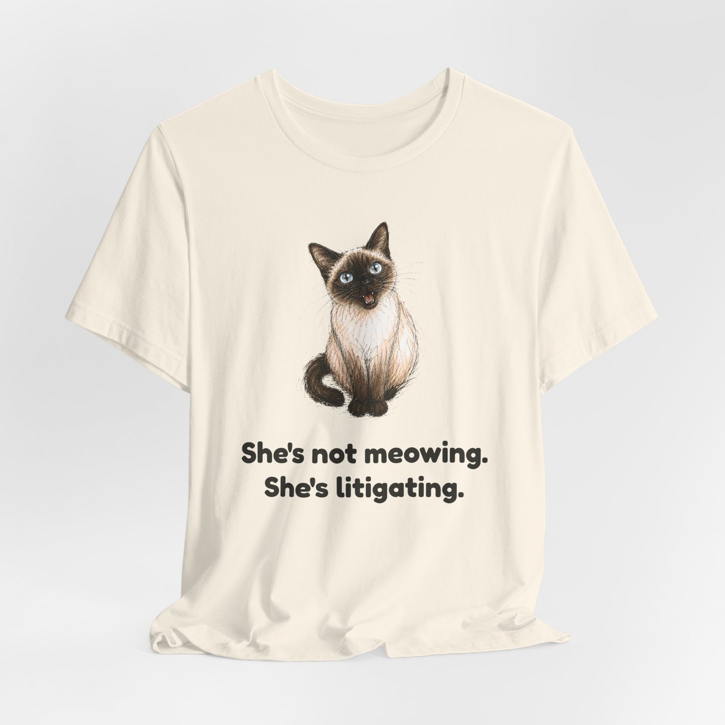 She's Not Meowing. She's Litigating. — Funny Cat T-Shirt
