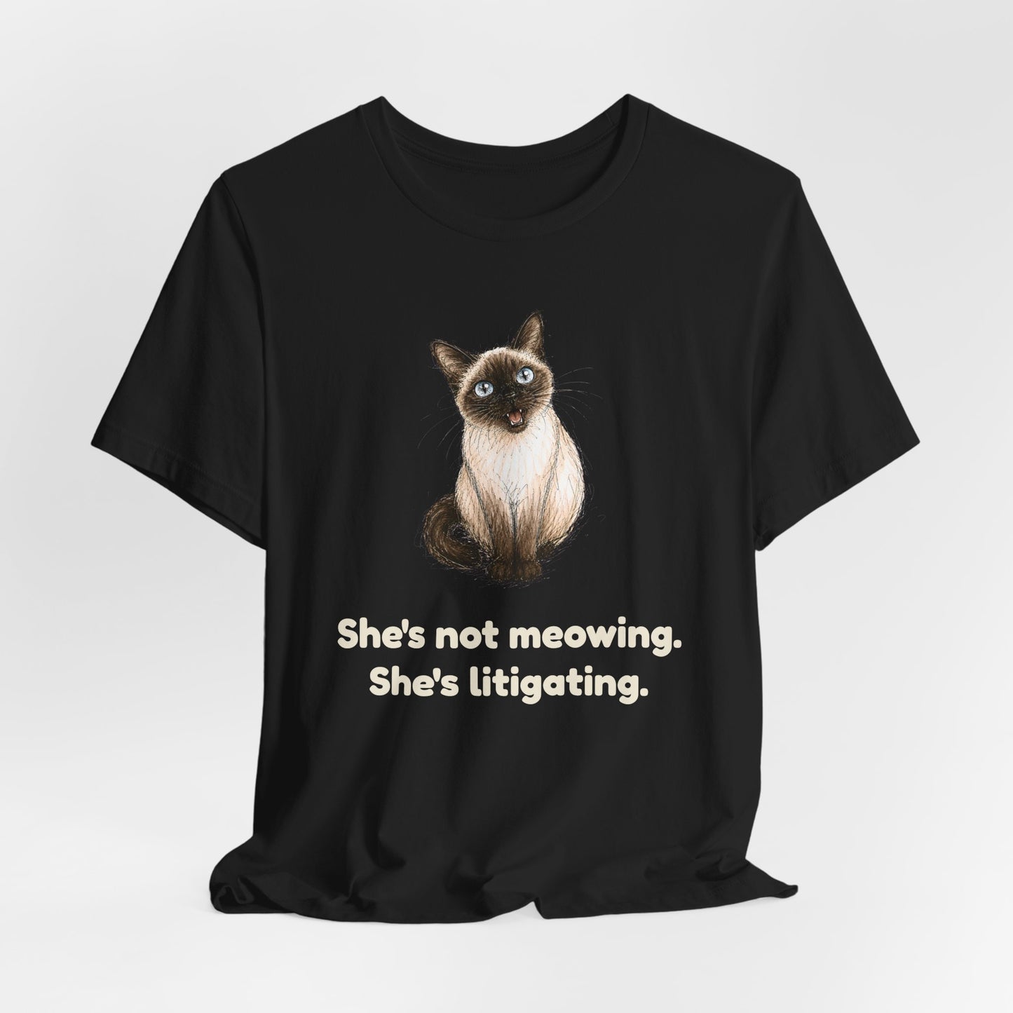 She's Not Meowing. She's Litigating. — Funny Cat T-Shirt